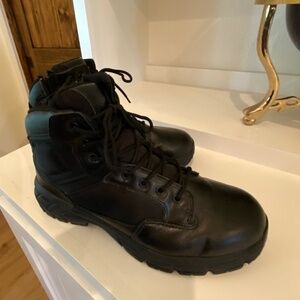 Men's Tactical Boots. Black leather upper and rubber sole.